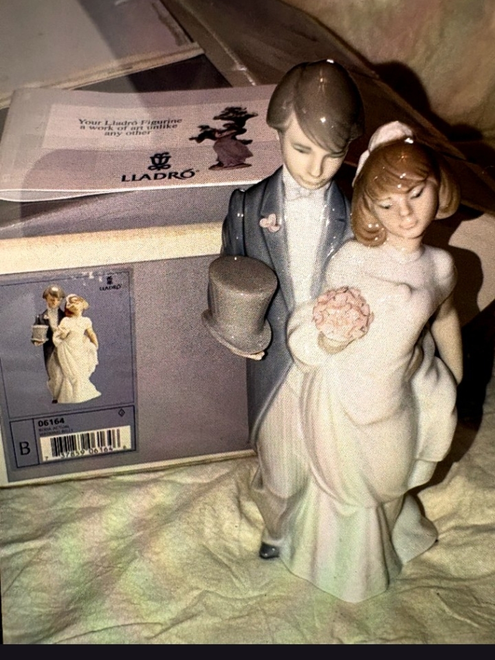 Lladro Porcelain Bride and Groom Figurine in White, Gray and Pink